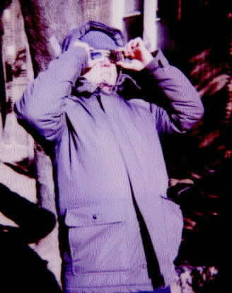 R. Paul watching the partial eclipse with special glasses